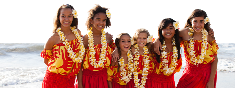 Group of six polynesian Hula girls in Friendship looking at camera